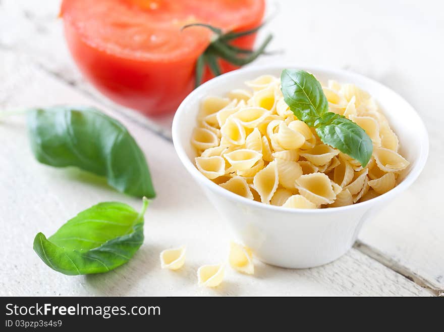 Raw pasta in a bowl