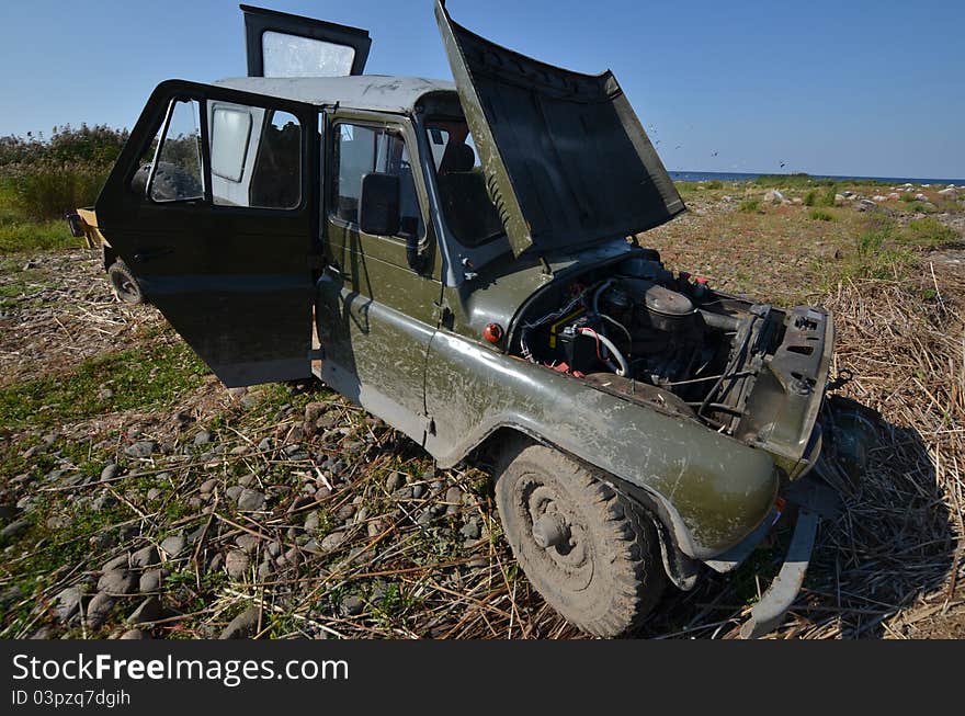 Old off-road car on pit-spot. Old off-road car on pit-spot