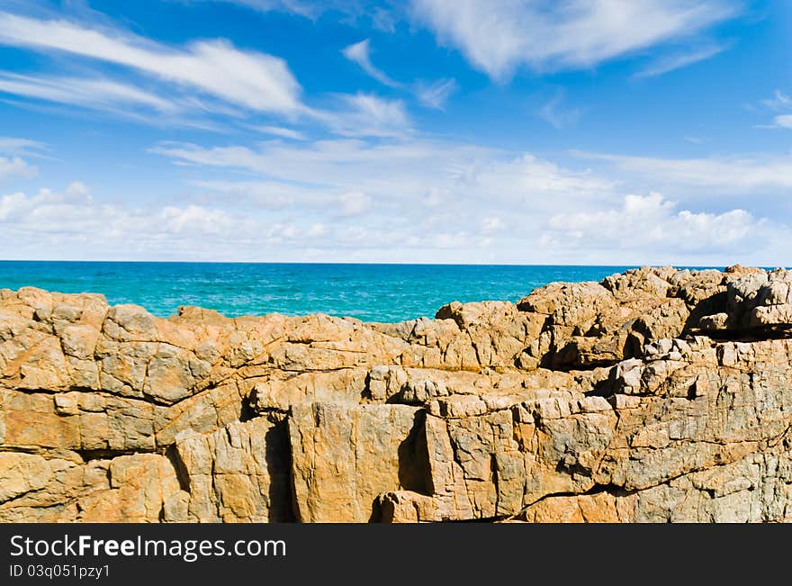 Sea Appearing Behind Rocks.