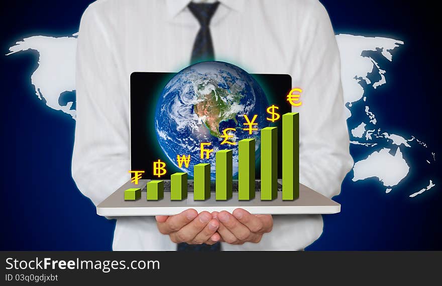 Businessman holding laptop with currency graph