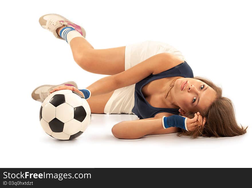 girl doing fitness with soccer ball over white background. girl doing fitness with soccer ball over white background