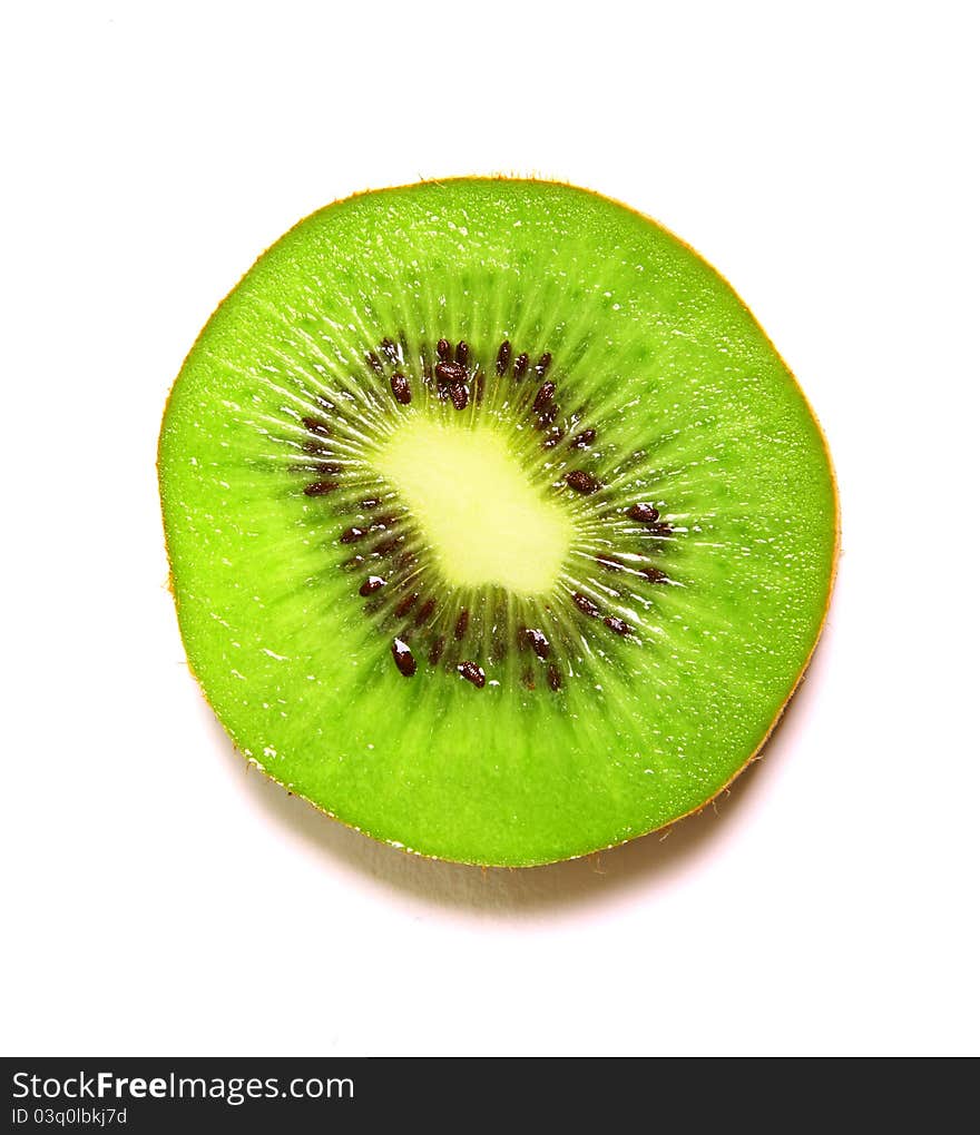 Sliced kiwi over white