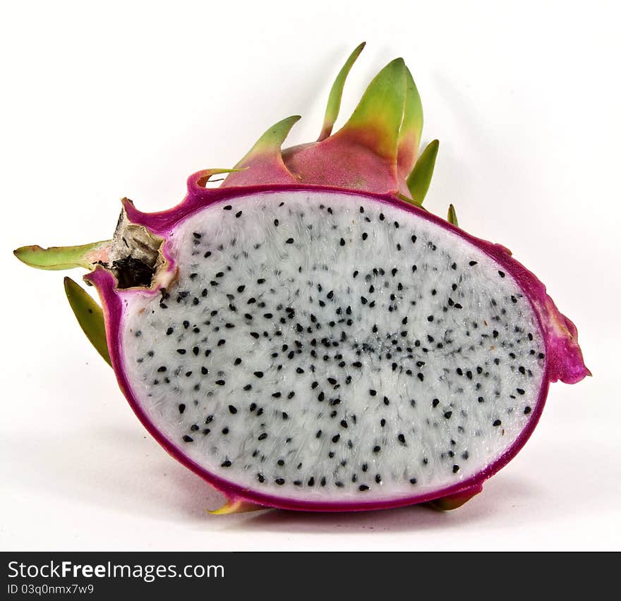 Whole and half dragon fruit