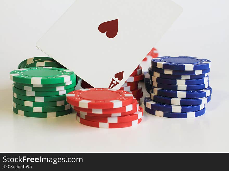 A close up image of the Ace of Hearts on a pile of poker chips.