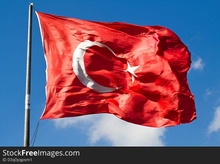 Great turkish flag on blue sky. Great turkish flag on blue sky