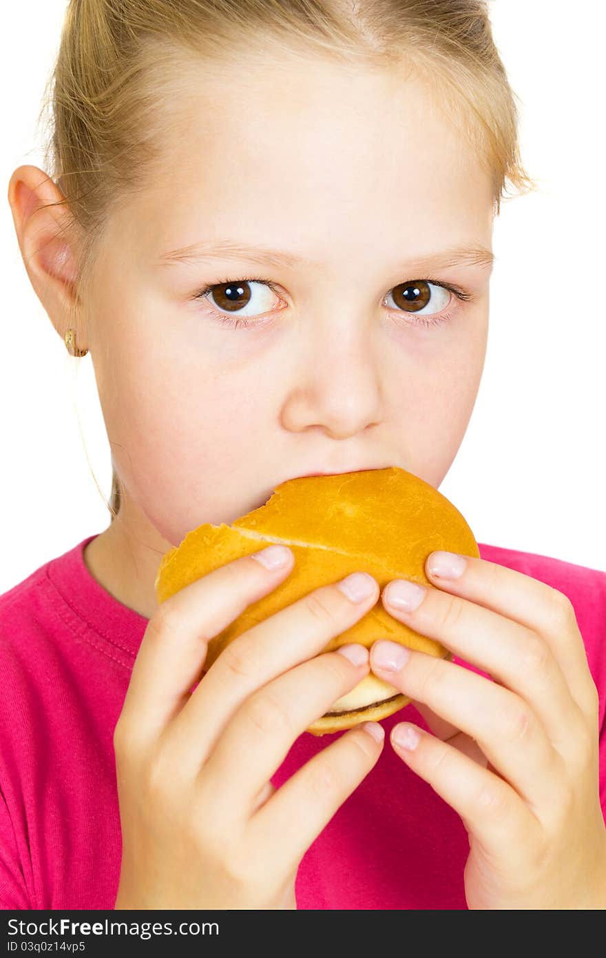 Little Girl Eating Hamburger.