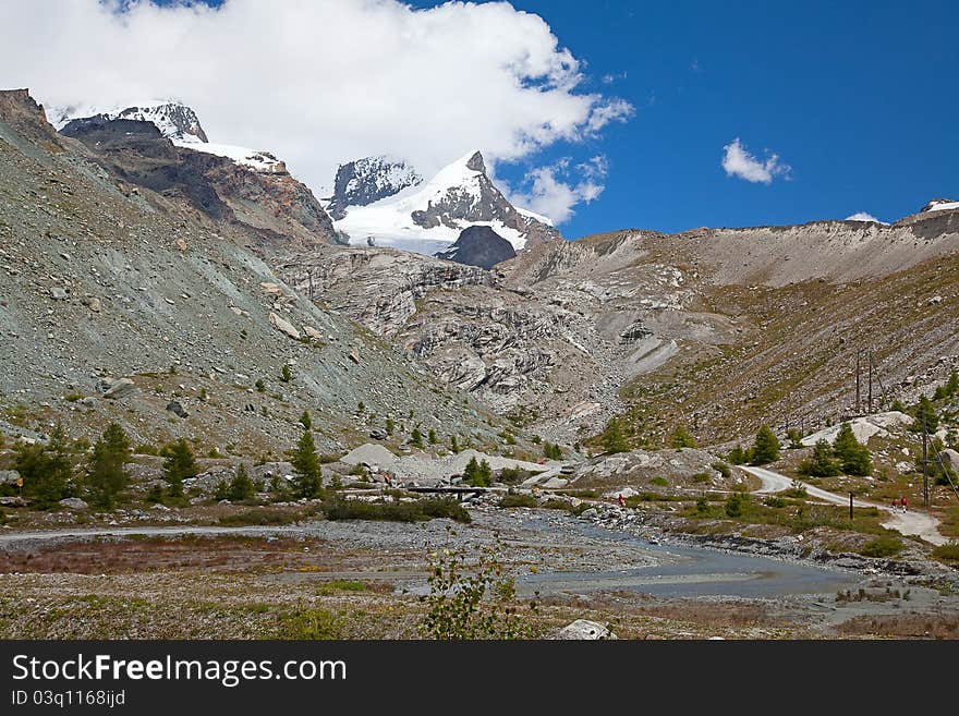 High alpine hiking route near famous mountain Matterhorn (peak Cervino)