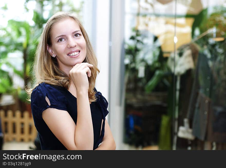 Portrait of a beautiful woman in the store