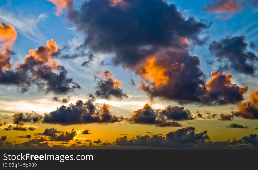 Cloudscape in gold and blue. Cloudscape in gold and blue.