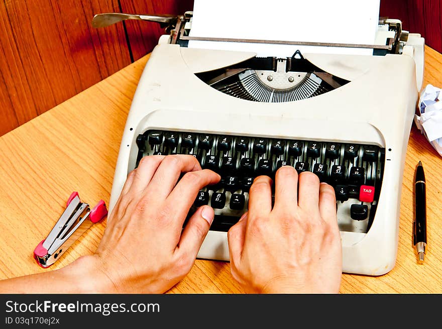 Typewriter in the office which is busy at business working time