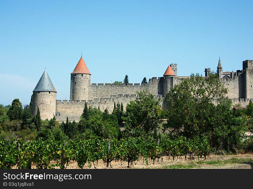 View on vineyards and Carcassonne castle in France, Languedoc. View on vineyards and Carcassonne castle in France, Languedoc