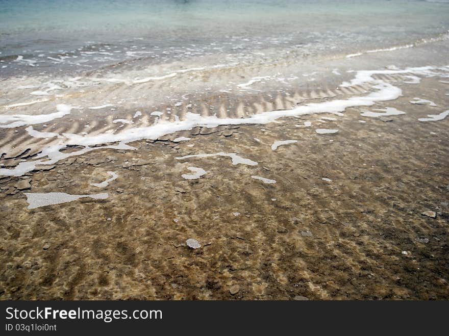 Coastline of dead Sea with salt on banks. Coastline of dead Sea with salt on banks