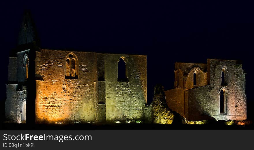 Colorful illuminated ruins of an 11th century cathedral at night,ile de re,france,october 2008. Colorful illuminated ruins of an 11th century cathedral at night,ile de re,france,october 2008.