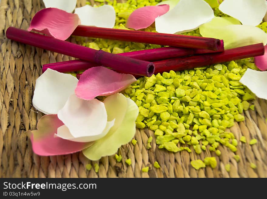 White and pink petals on a green background. White and pink petals on a green background