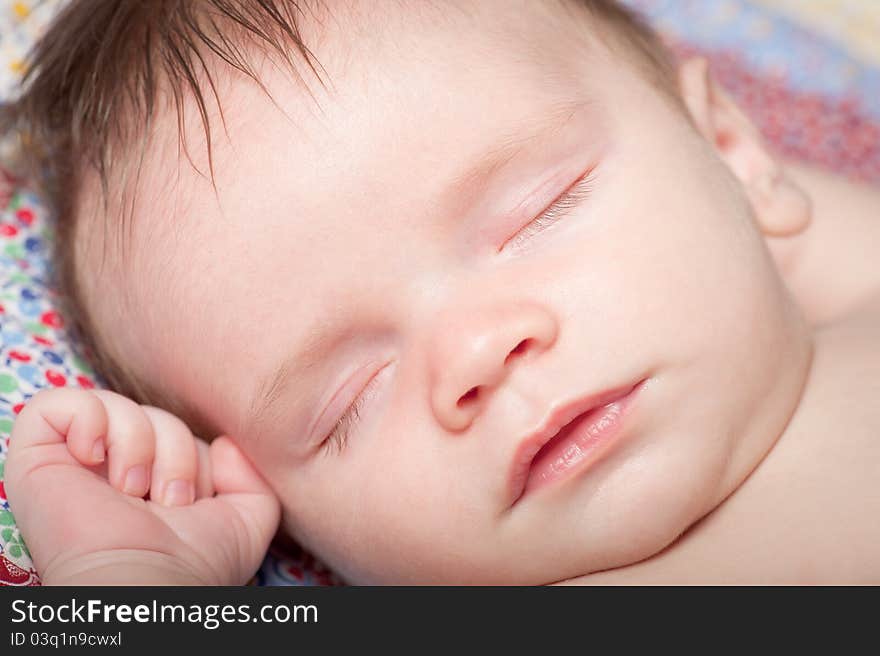 Closeup portrait of sleeping baby boy