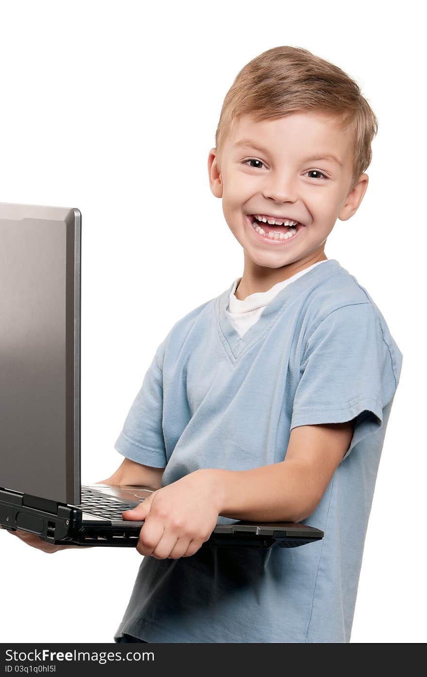 Portrait of funny little boy with notebook over white background