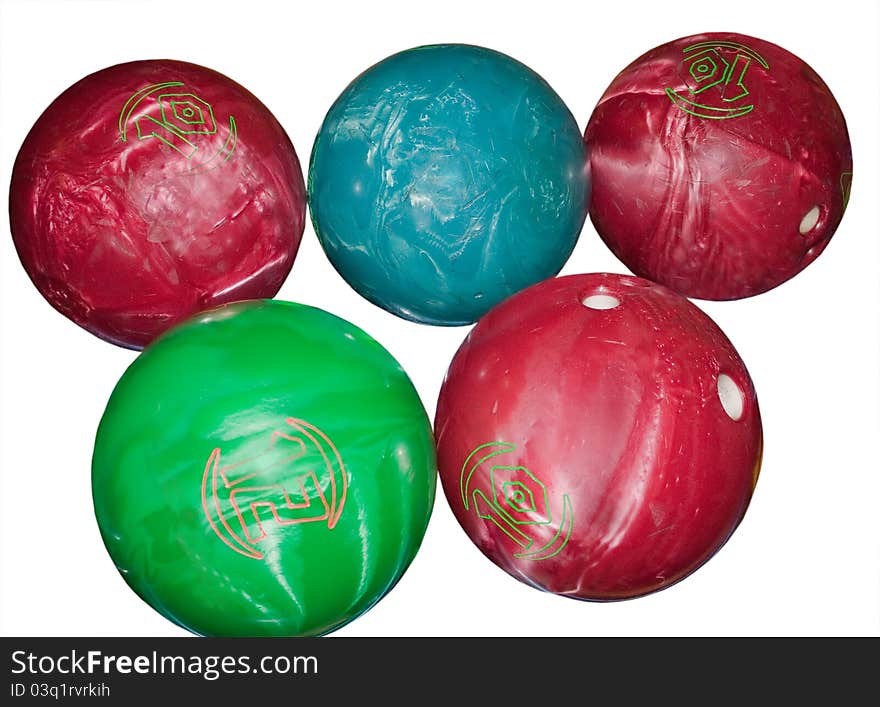 Five bowling balls isolated on white