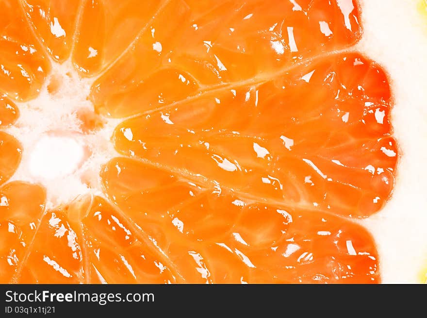 Close up half of ripe grapefruit. Food background.