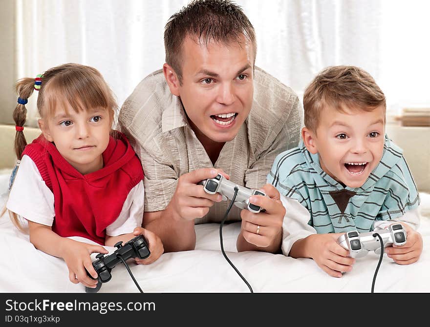 Happy family playing a video game