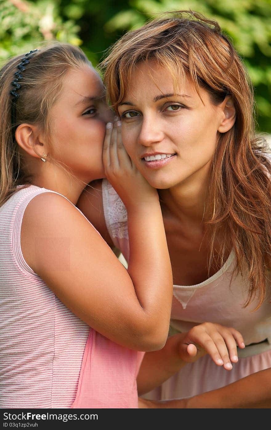 Happy mother with her daughter in park outdoors. Happy mother with her daughter in park outdoors