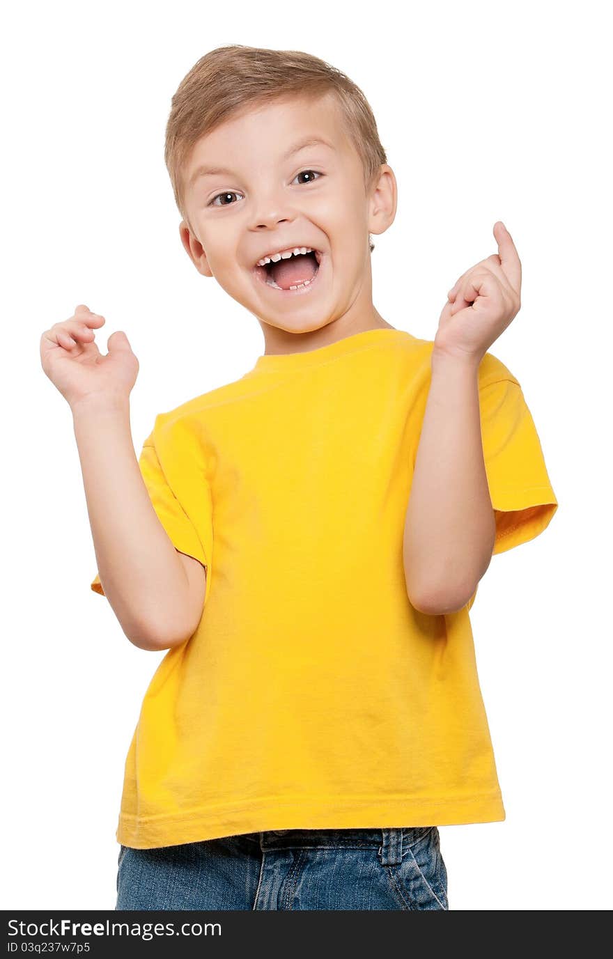 Happy little boy celebrating success over white background. Happy little boy celebrating success over white background