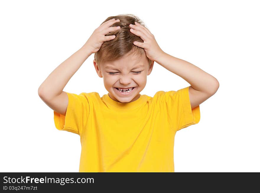 Portrait of shocked little boy with hands on head over white background. Portrait of shocked little boy with hands on head over white background