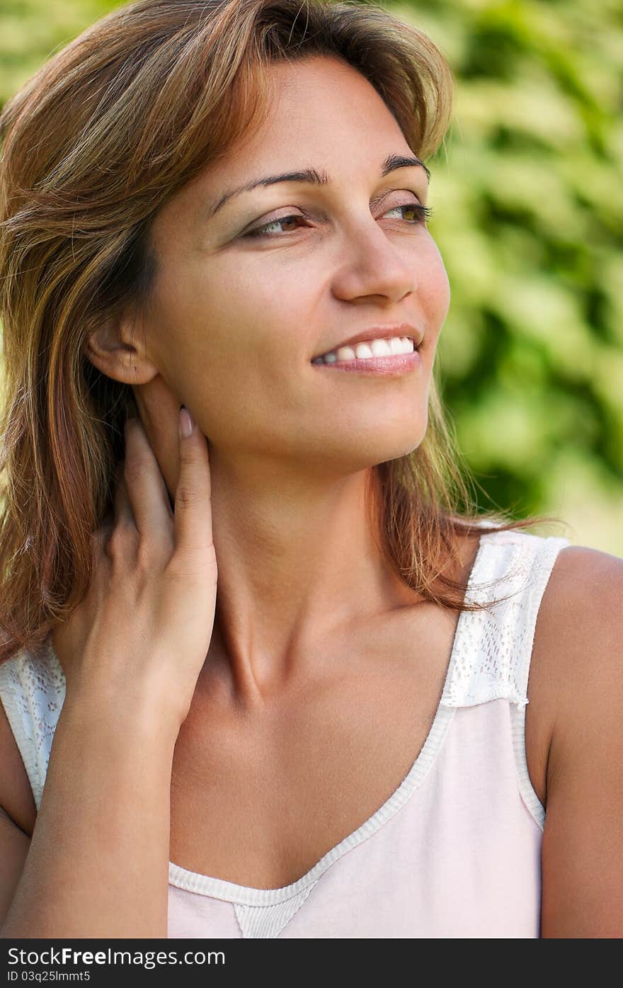 Close up portrait of beautiful caucasian woman in park. Close up portrait of beautiful caucasian woman in park