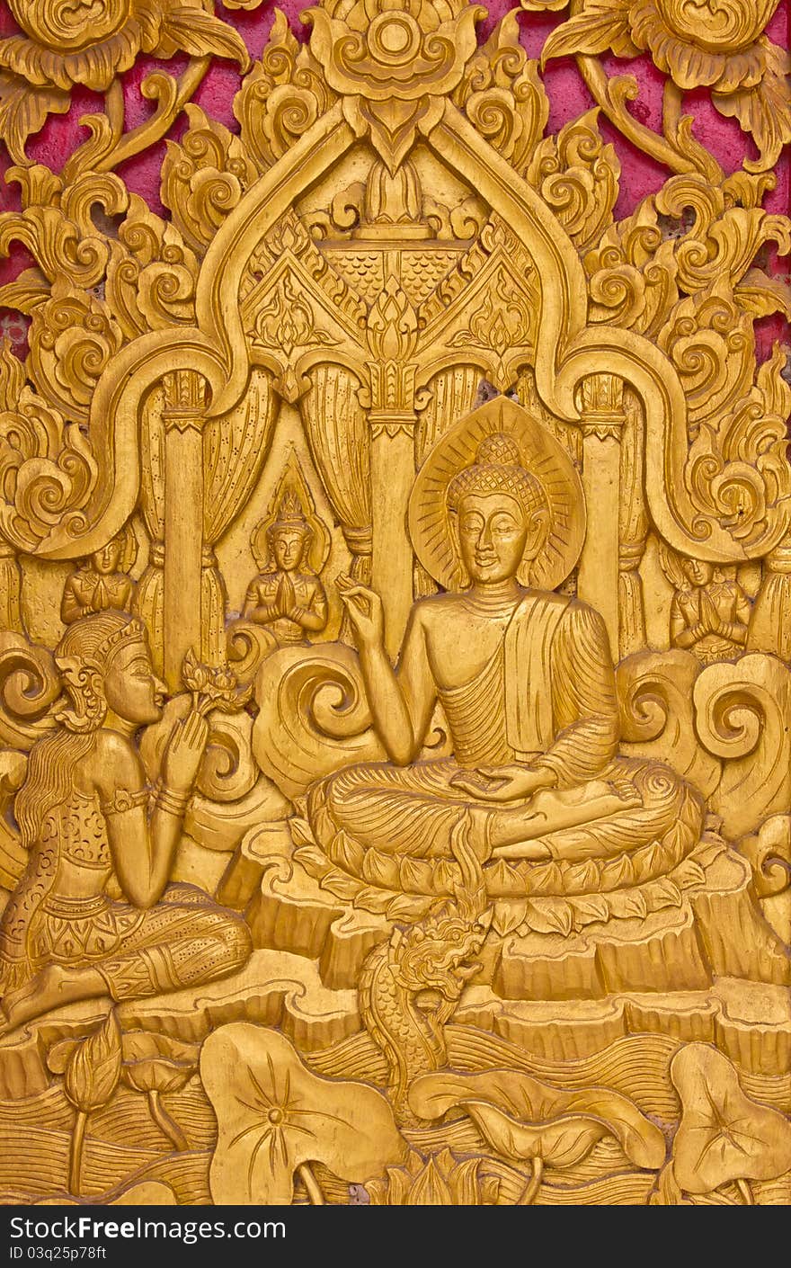 Buddha on the wood with naga