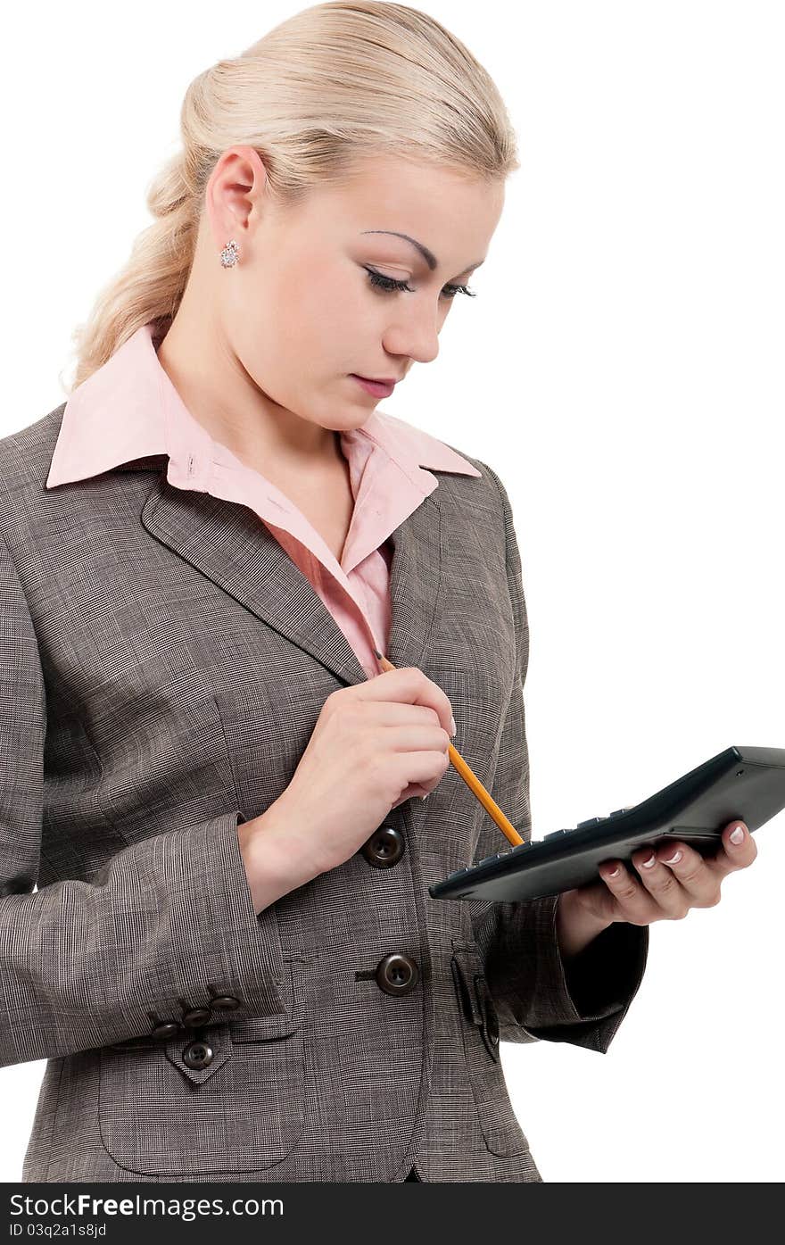 Young businesswoman with calculator - isolated on white background