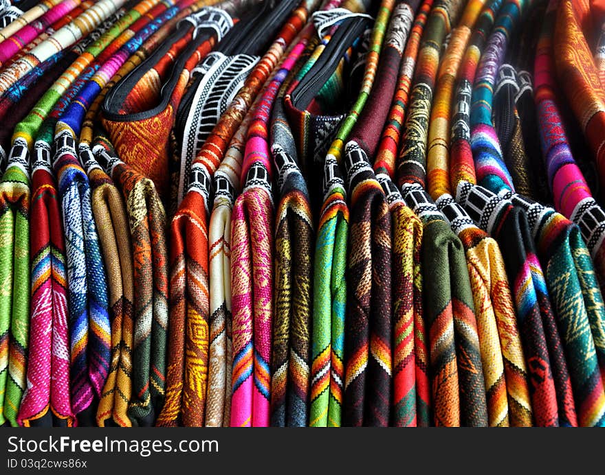 Peruvian fabric for sale in a marketplace. Peruvian fabric for sale in a marketplace.