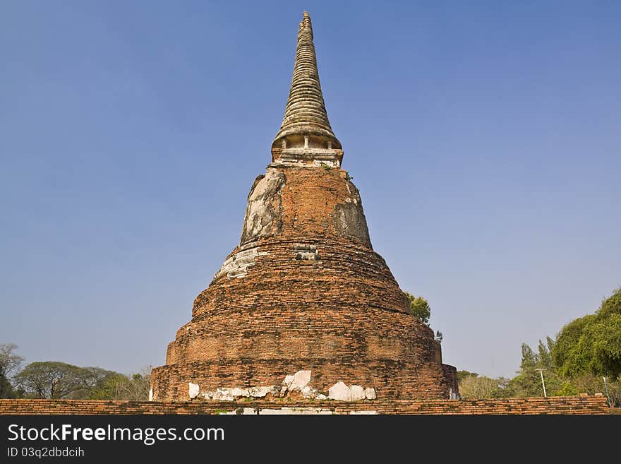 The ruins of an ancient pagoda in a temple in Thailand. The ruins of an ancient pagoda in a temple in Thailand