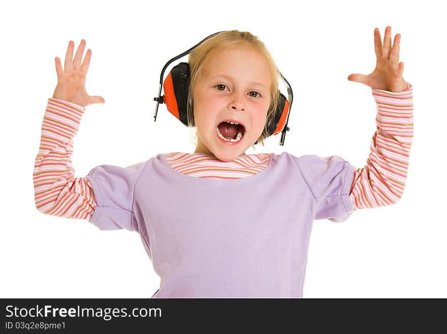 Little girl listening to music on white background