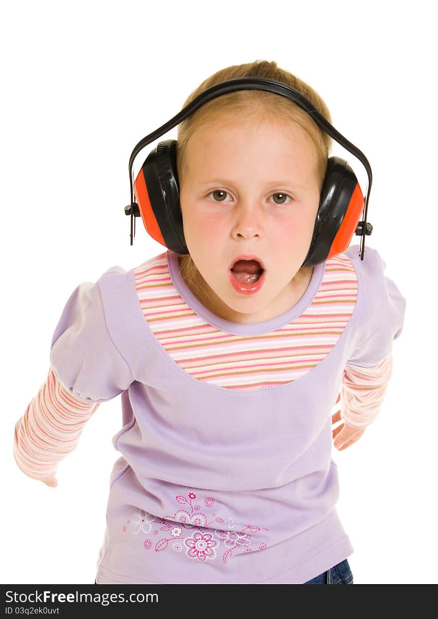 Little girl listening to music on white background