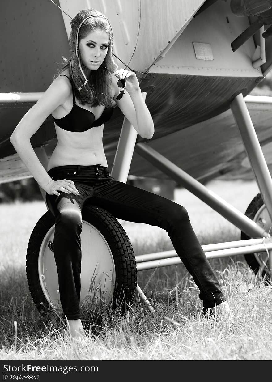 Female portrait. retro style aircraft pilot