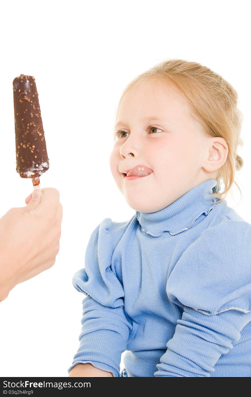 Girl eating ice cream on a white background.