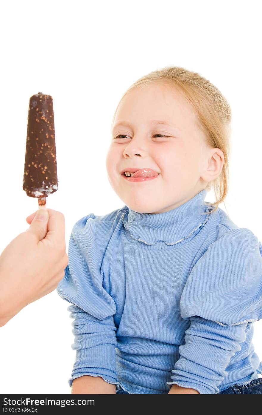 Girl eating ice cream on a white background.