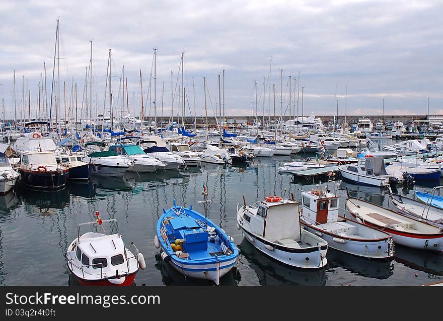 Different kinds of boats in the parking of the port of San Remo. Different kinds of boats in the parking of the port of San Remo