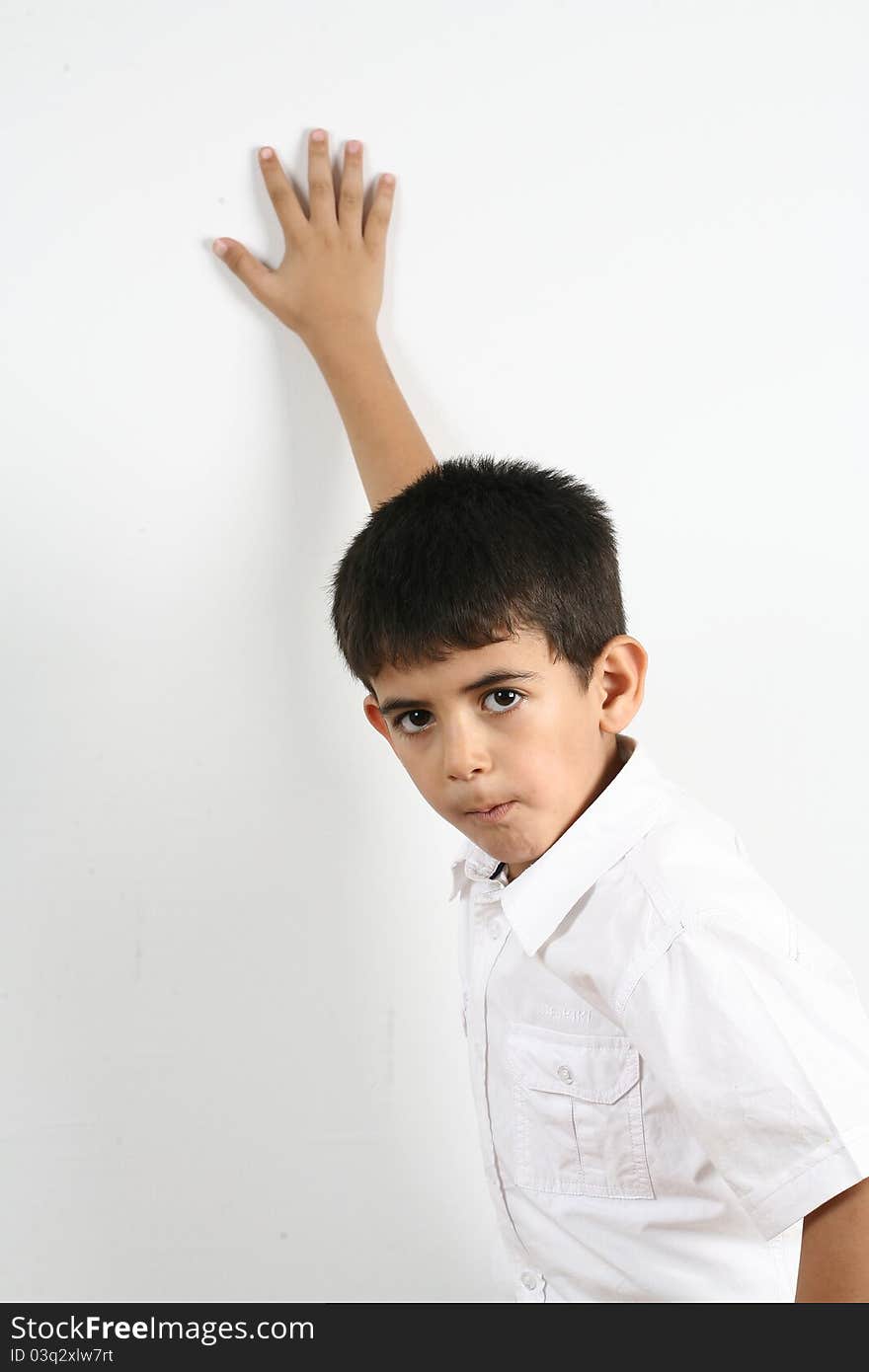 Portrait of happy little boy over white background. Portrait of happy little boy over white background