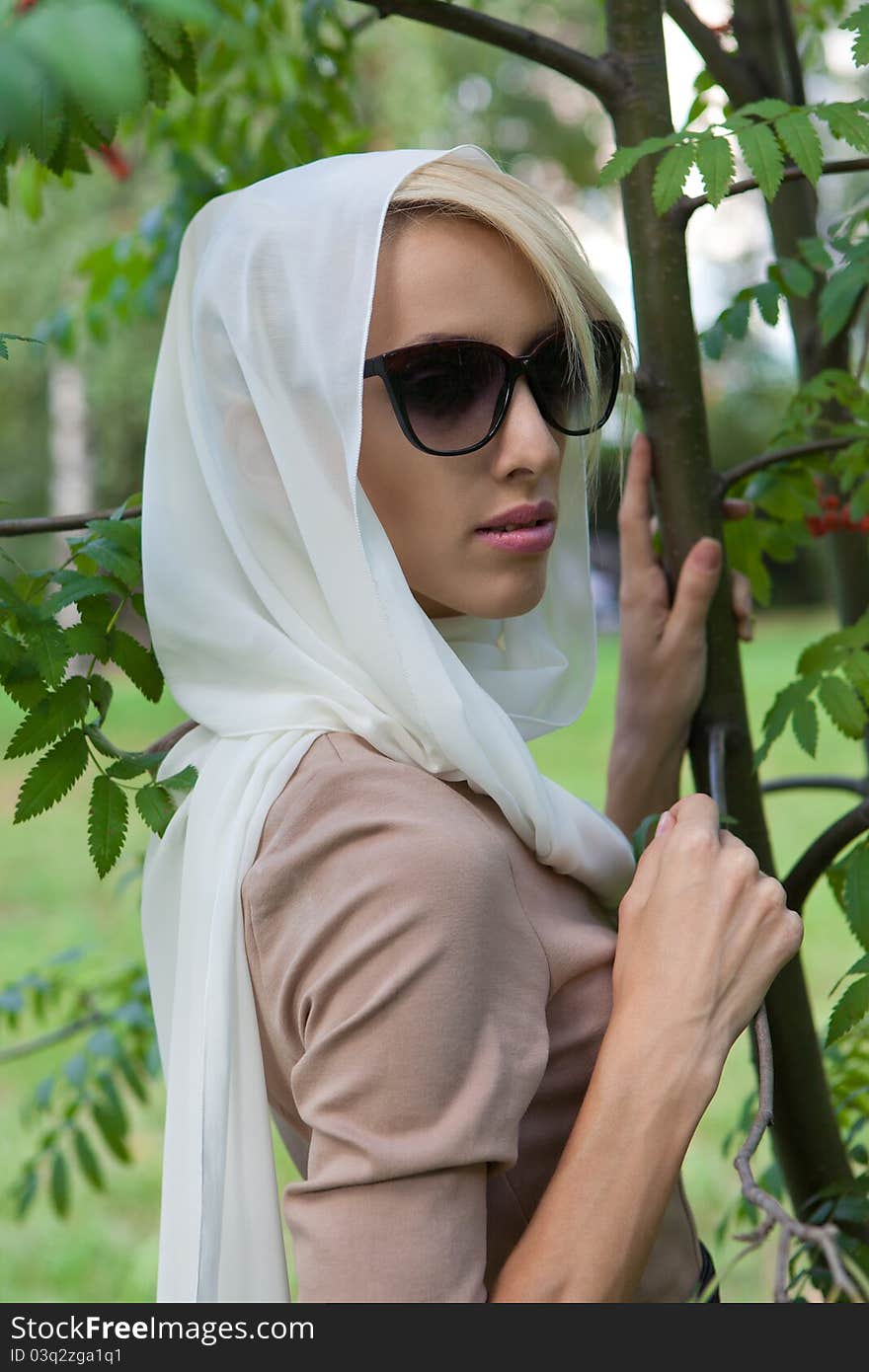 Woman in a white scarf