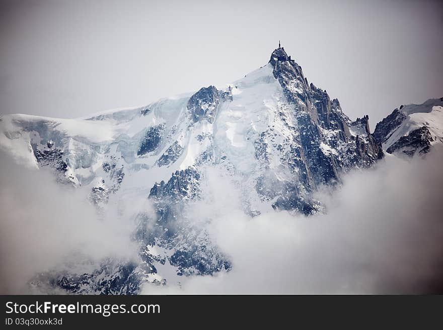 Top of mountains in blue sky