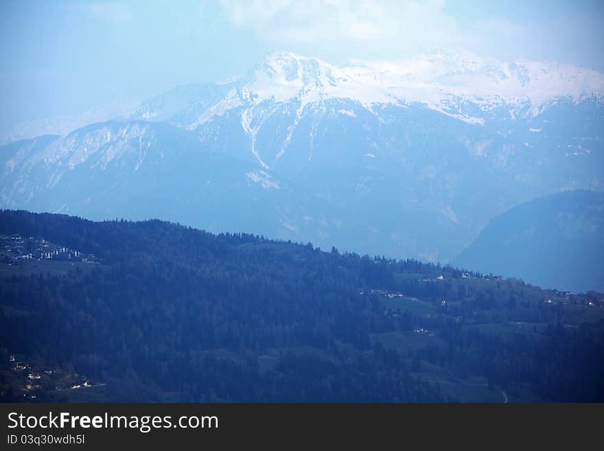 Top of mountains sun in blue sky