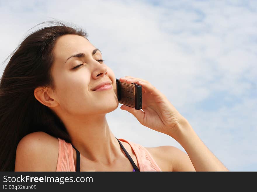 Young woman talking on the phone