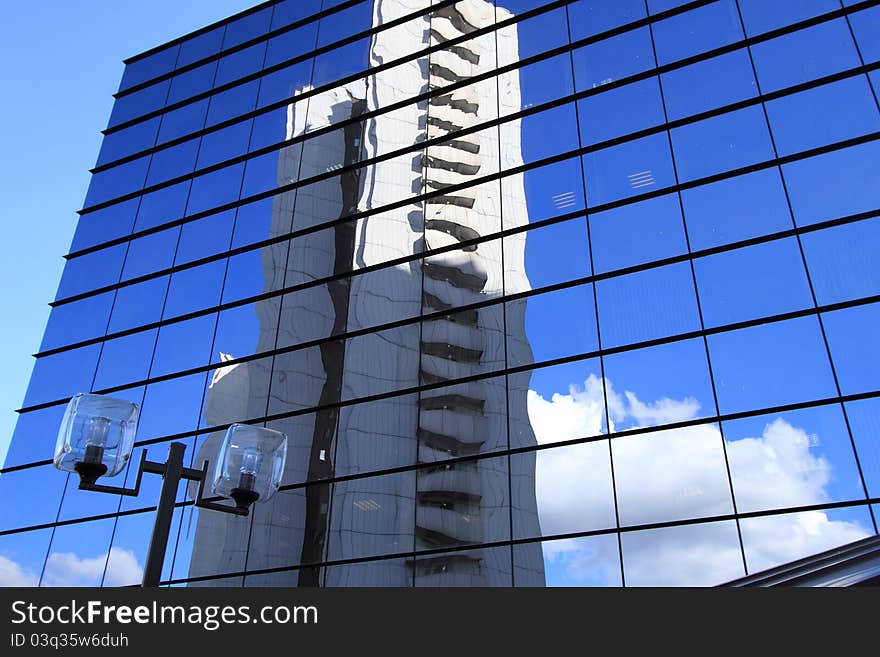 Office  Building And Reflection In Its Windows