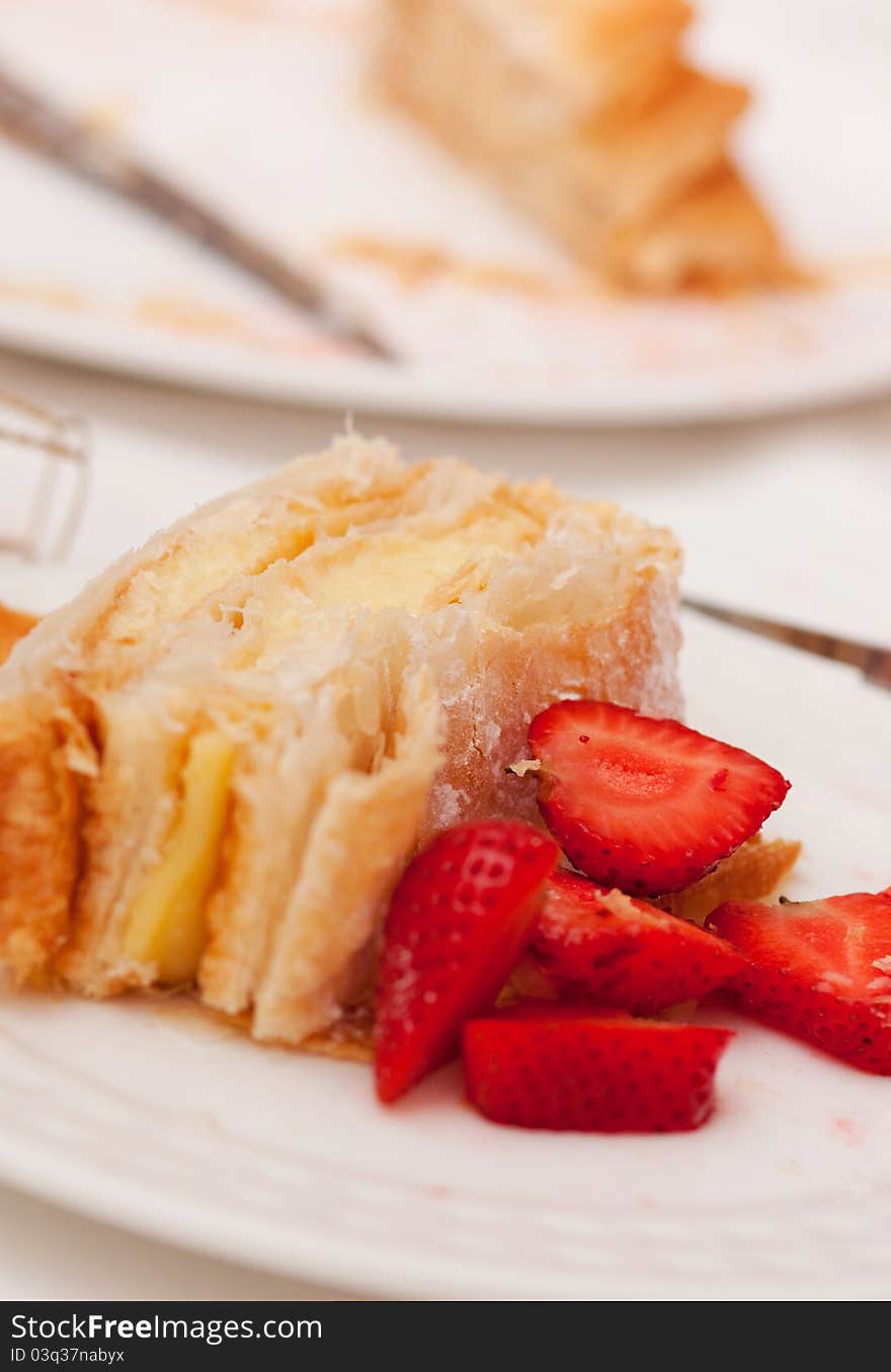 Homemade cake, pastry cream and strawberries