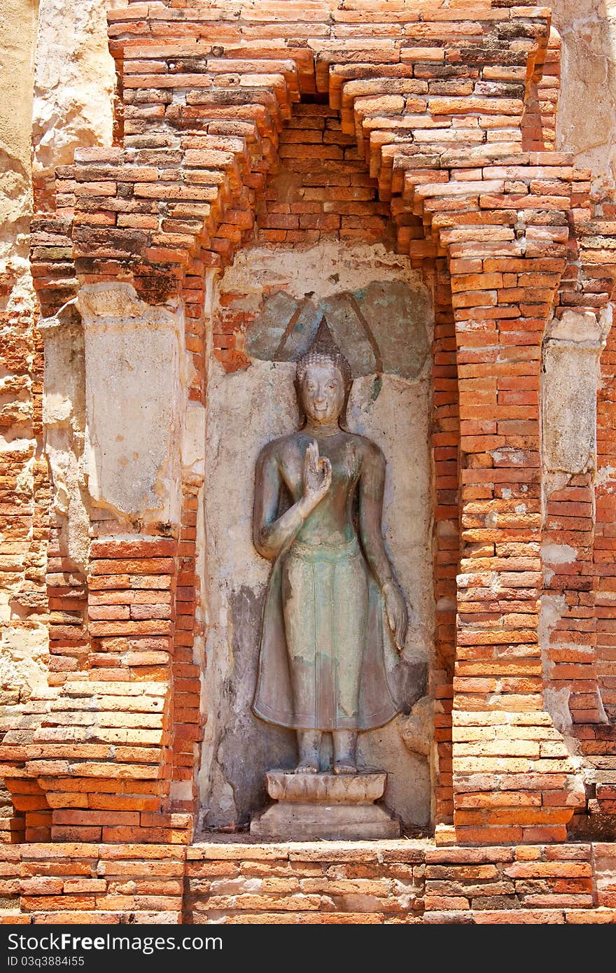 Buddha Carving on wall in Thailand