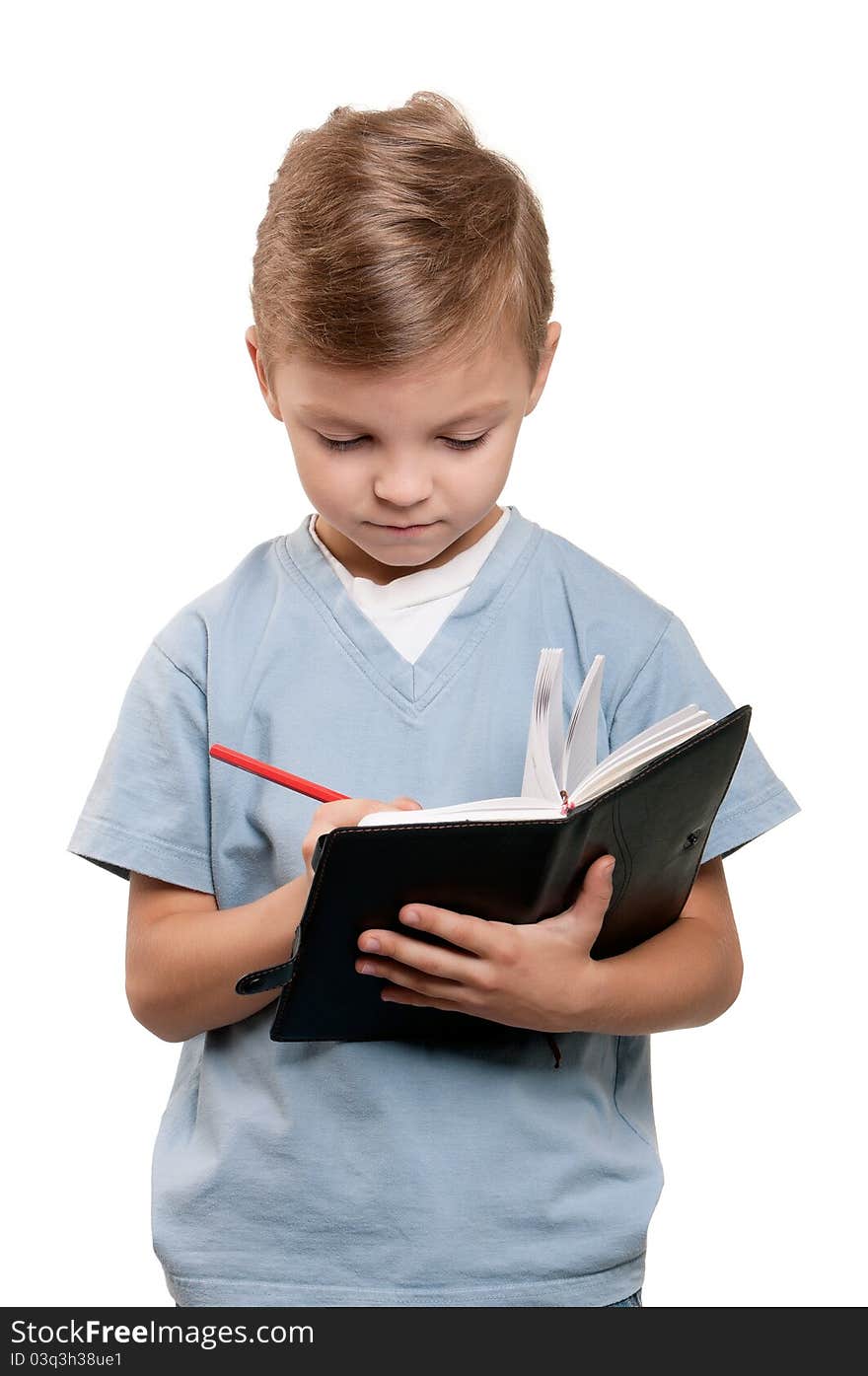 Portrait of a funny little boy holding a books over white background. Portrait of a funny little boy holding a books over white background