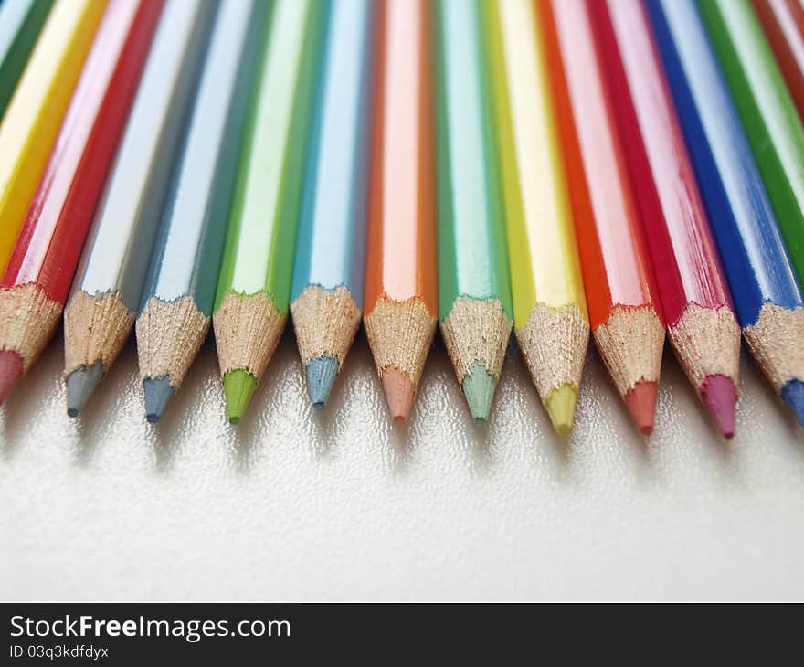 Colorful crayons on a background