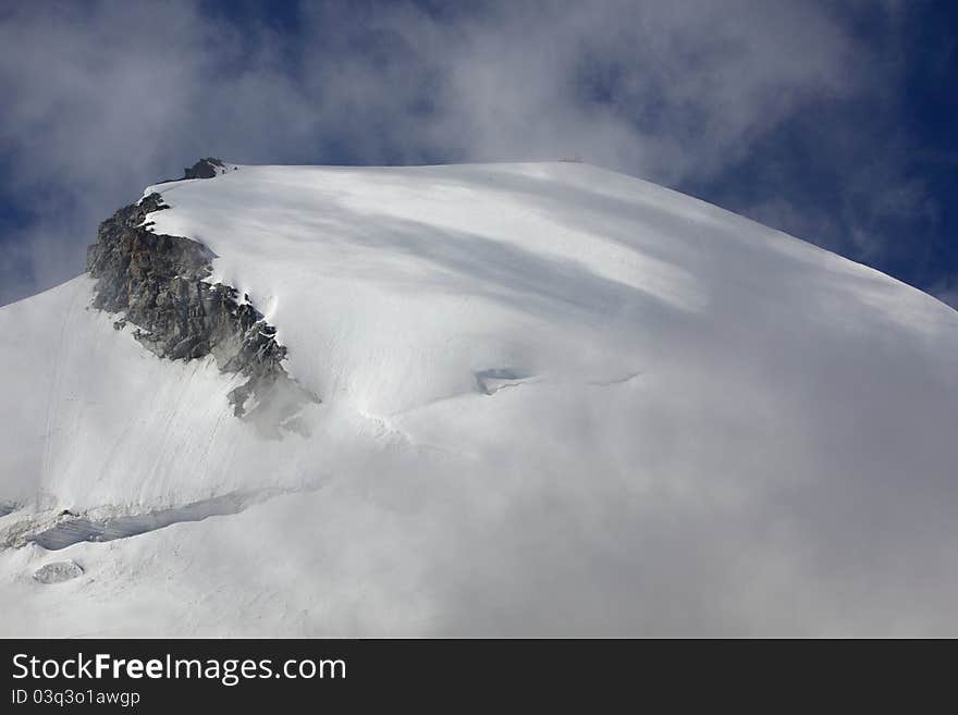 The detail of Allalinhorn mountain in Pennine Alps, Switzerland. The detail of Allalinhorn mountain in Pennine Alps, Switzerland.