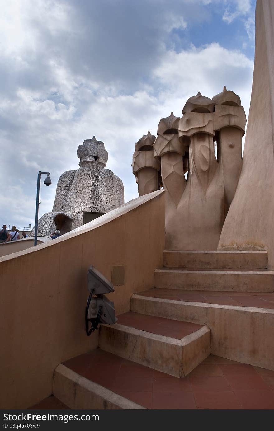 A pciture taken on the roof of the house Milà la Pedrera in Barcelona,with its particular chimneys. A pciture taken on the roof of the house Milà la Pedrera in Barcelona,with its particular chimneys