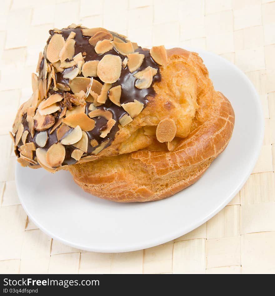 Macro of one profiterole on plate